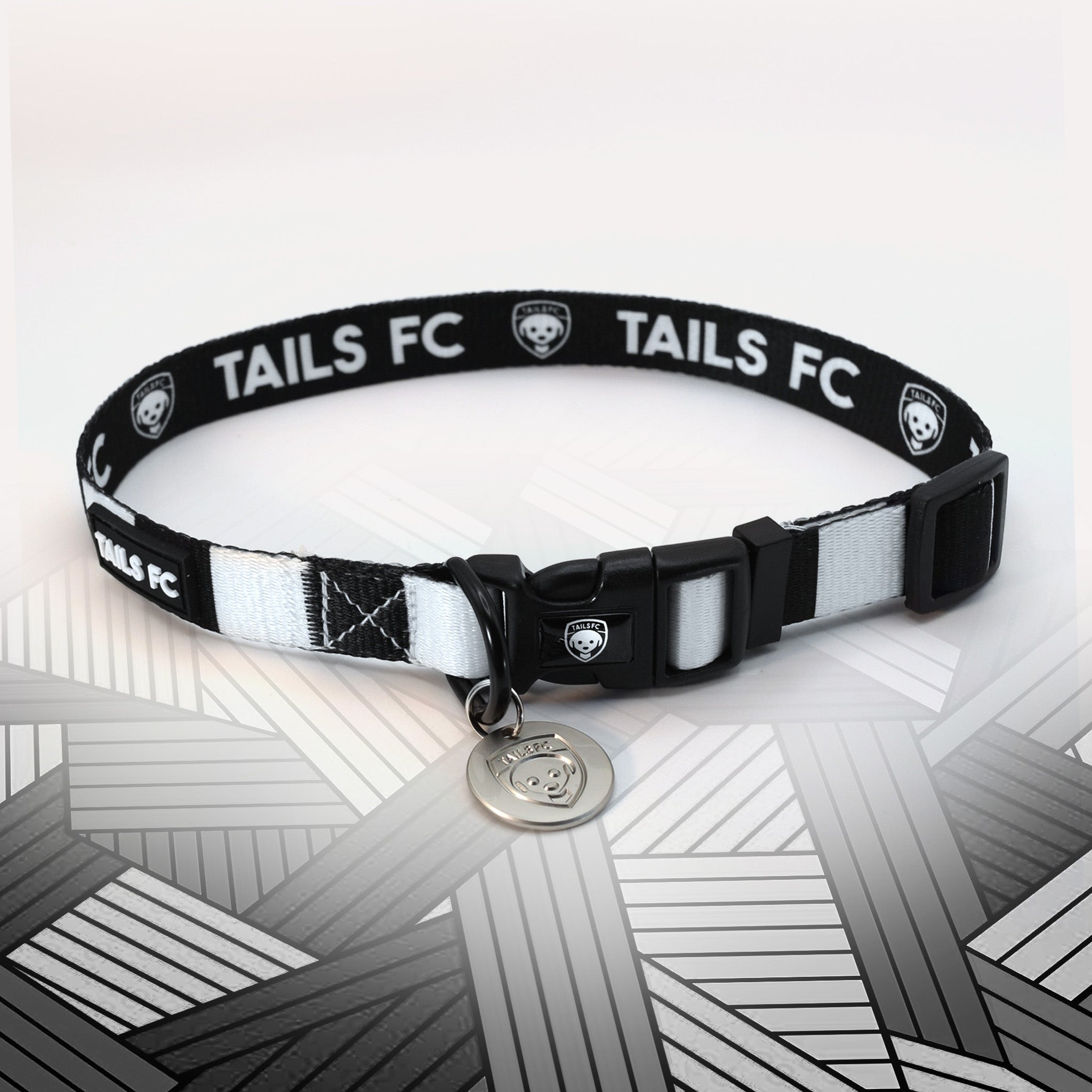 Derby Black and white stripe dog collar with 'TAILS FC' logo