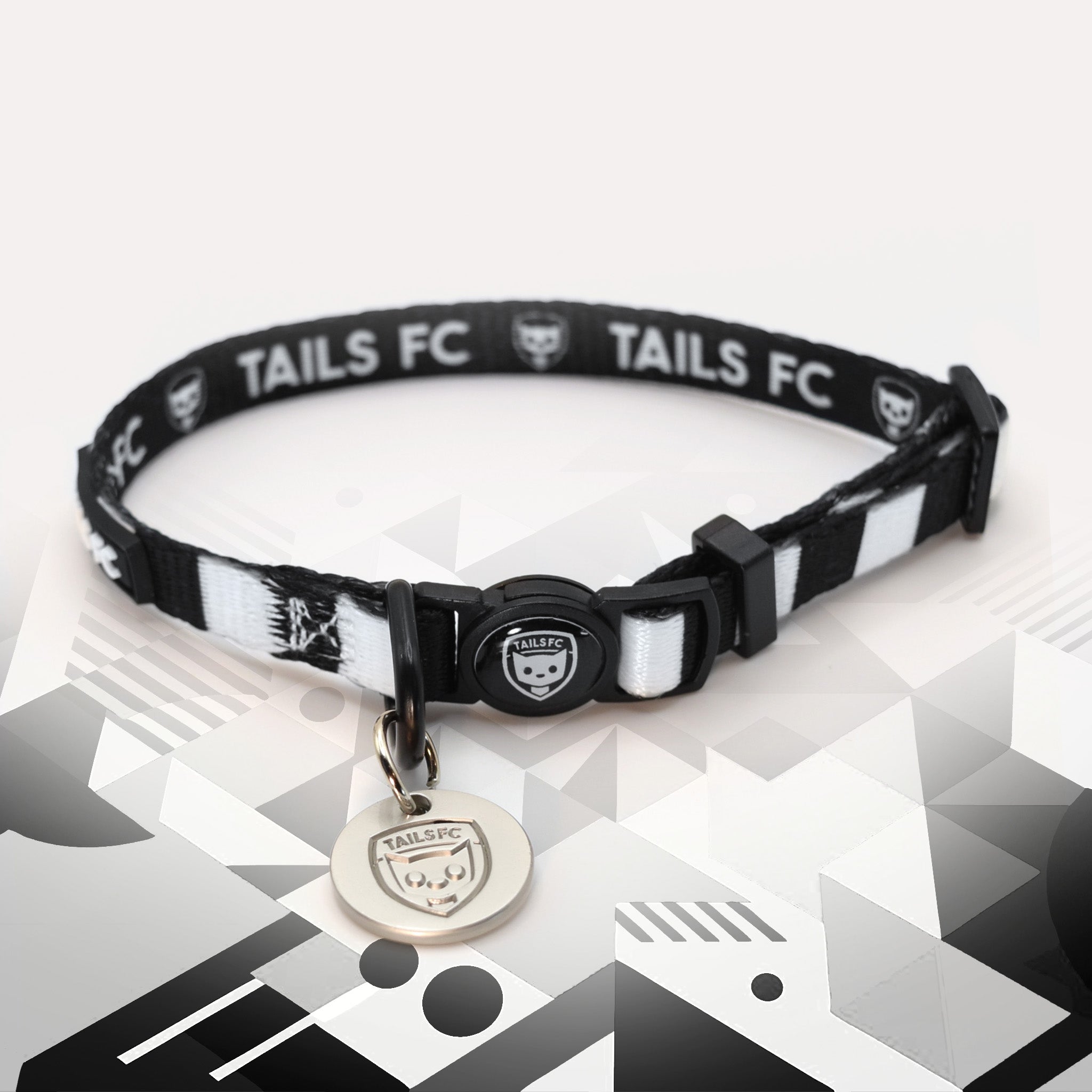 Derby Black and white stripe cat collar with 'TAILS FC' logo