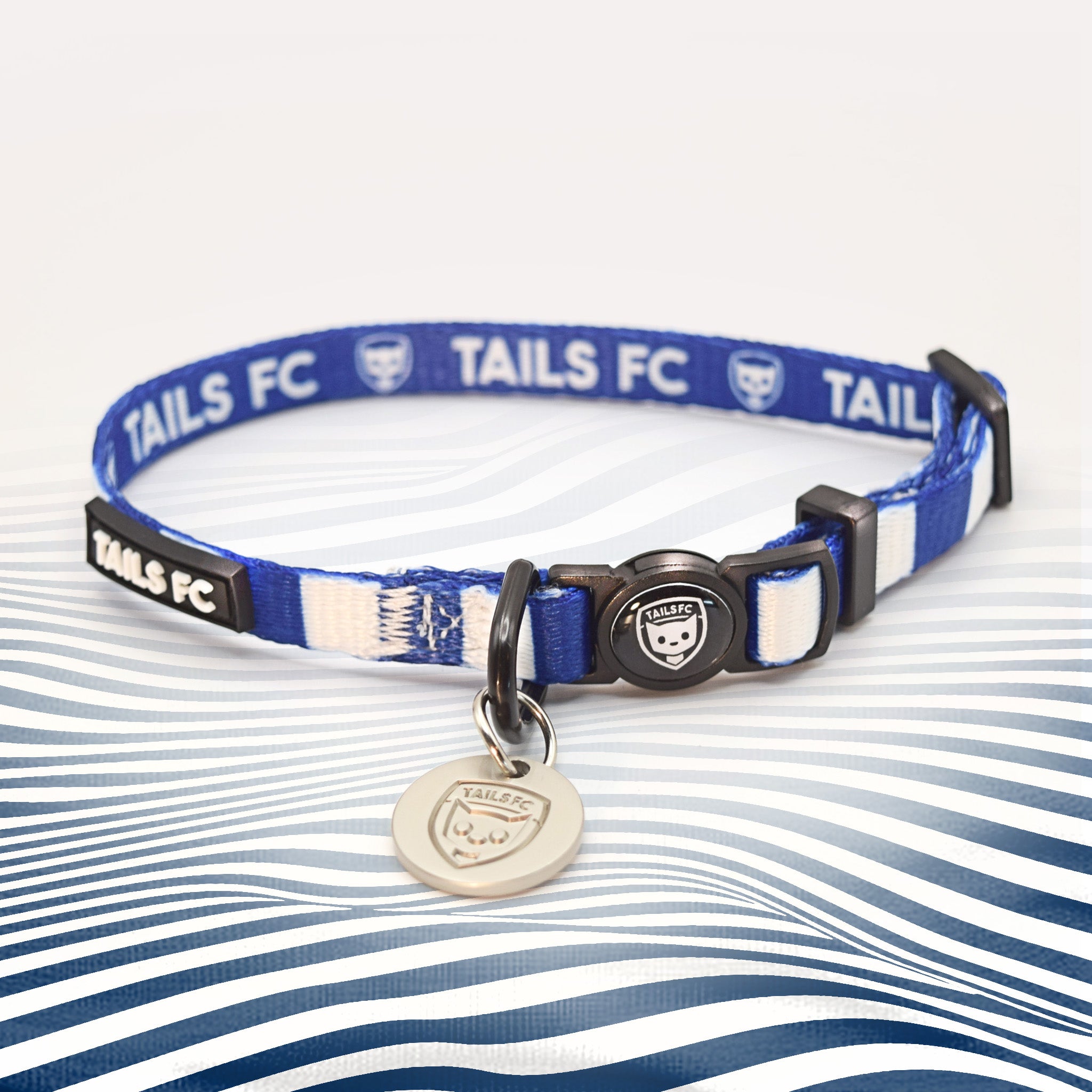 Tottenham blue and white striped cat collar.