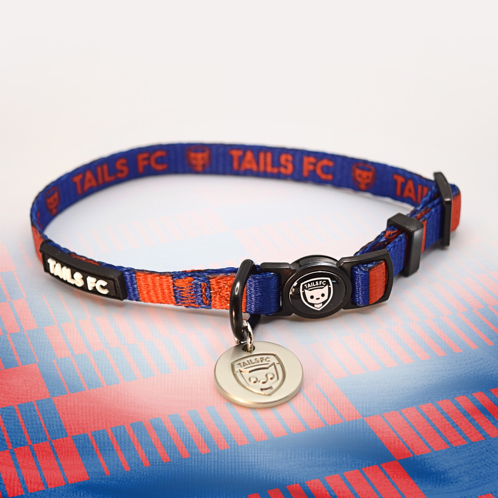 Crystal Palace blue and red striped cat collar.