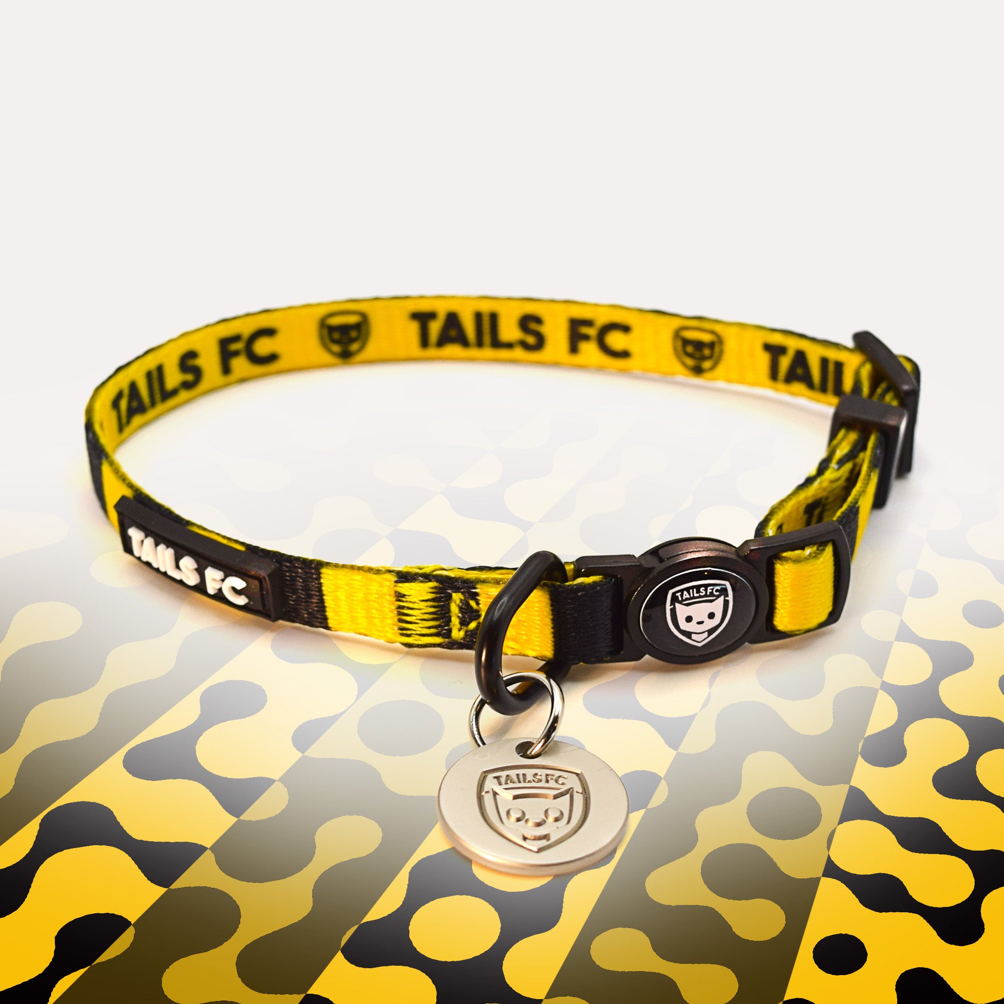 Yellow and black stripe cat collar with 'TAILS FC' logo