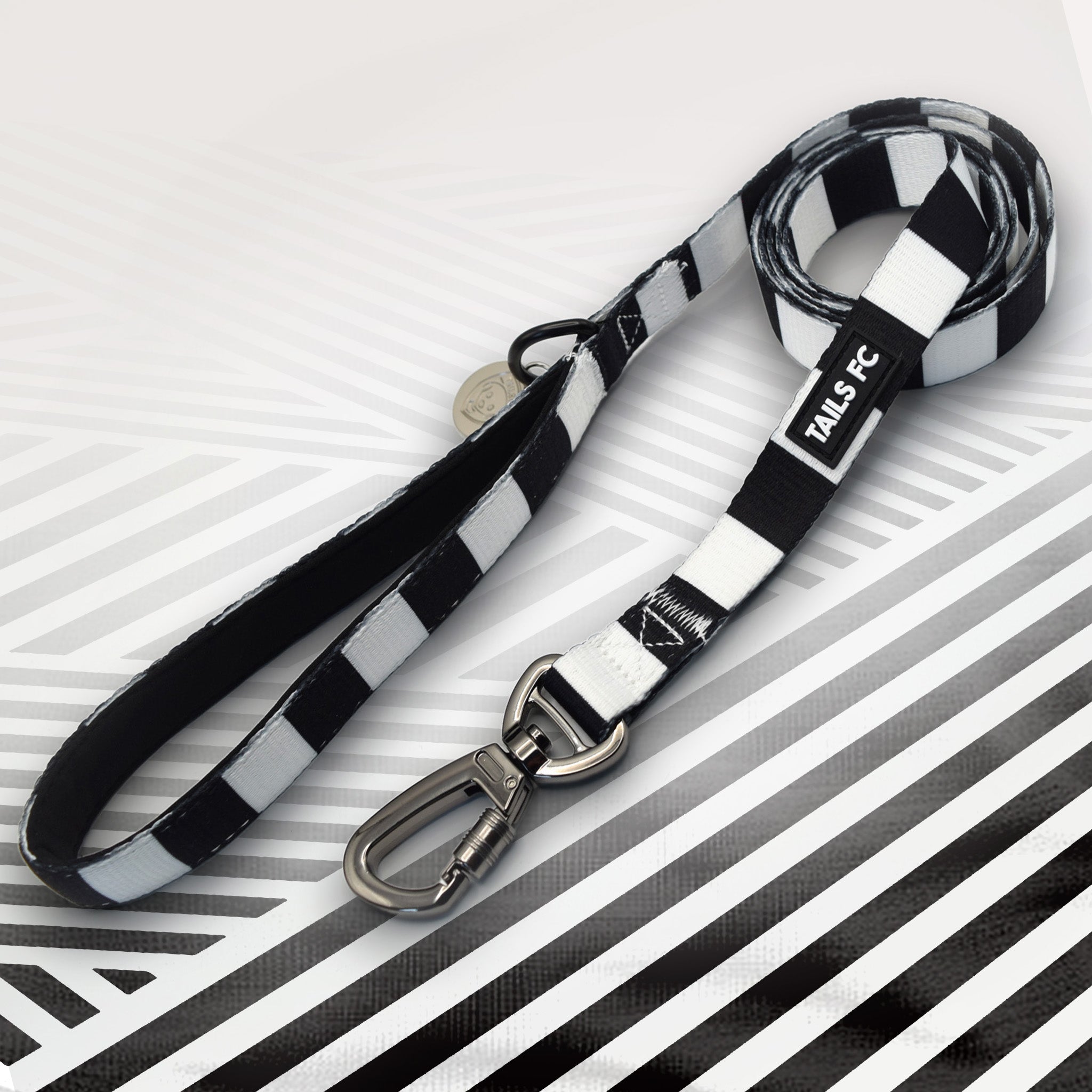 Newcastle black and white striped dog lead.