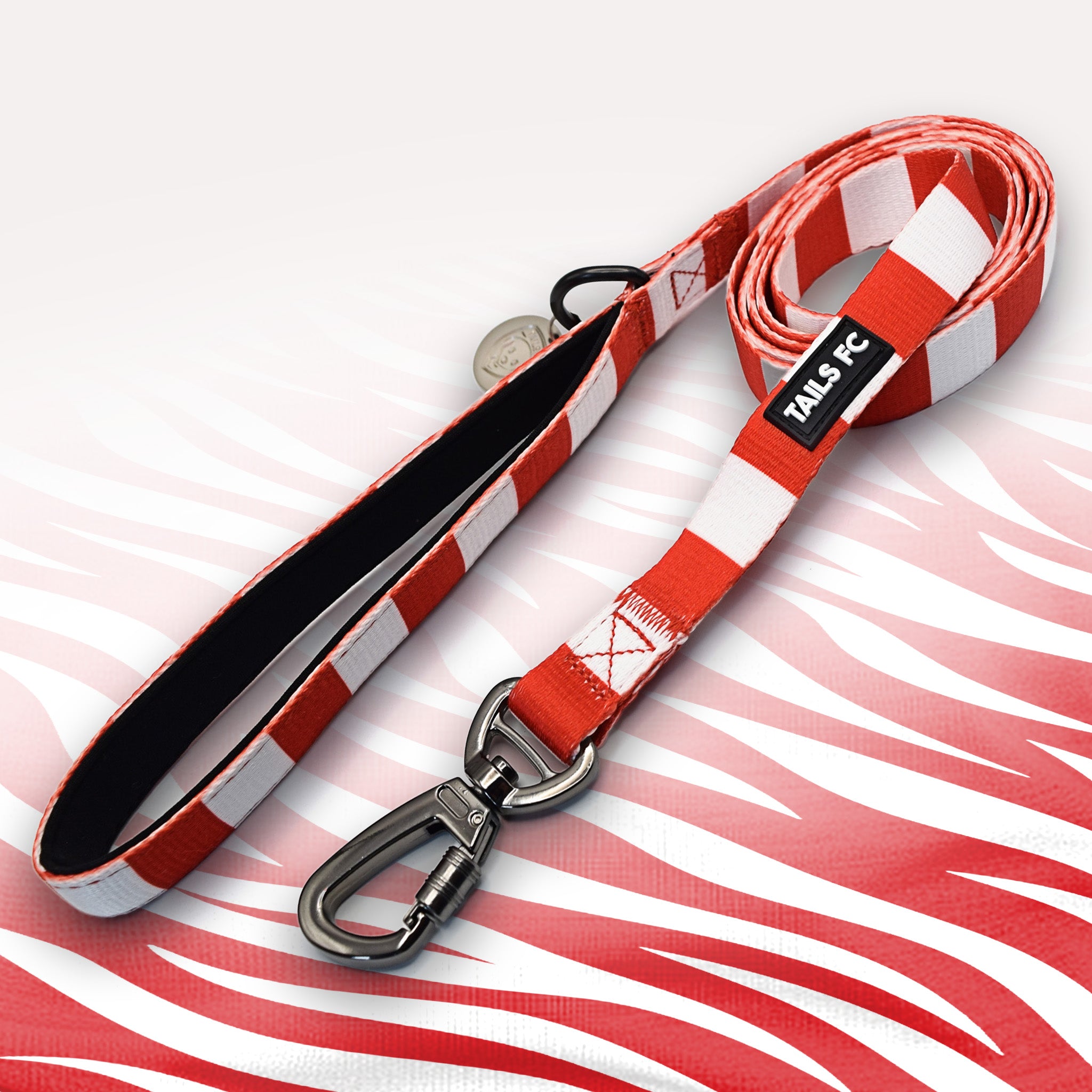 Arsenal red and white striped dog lead.