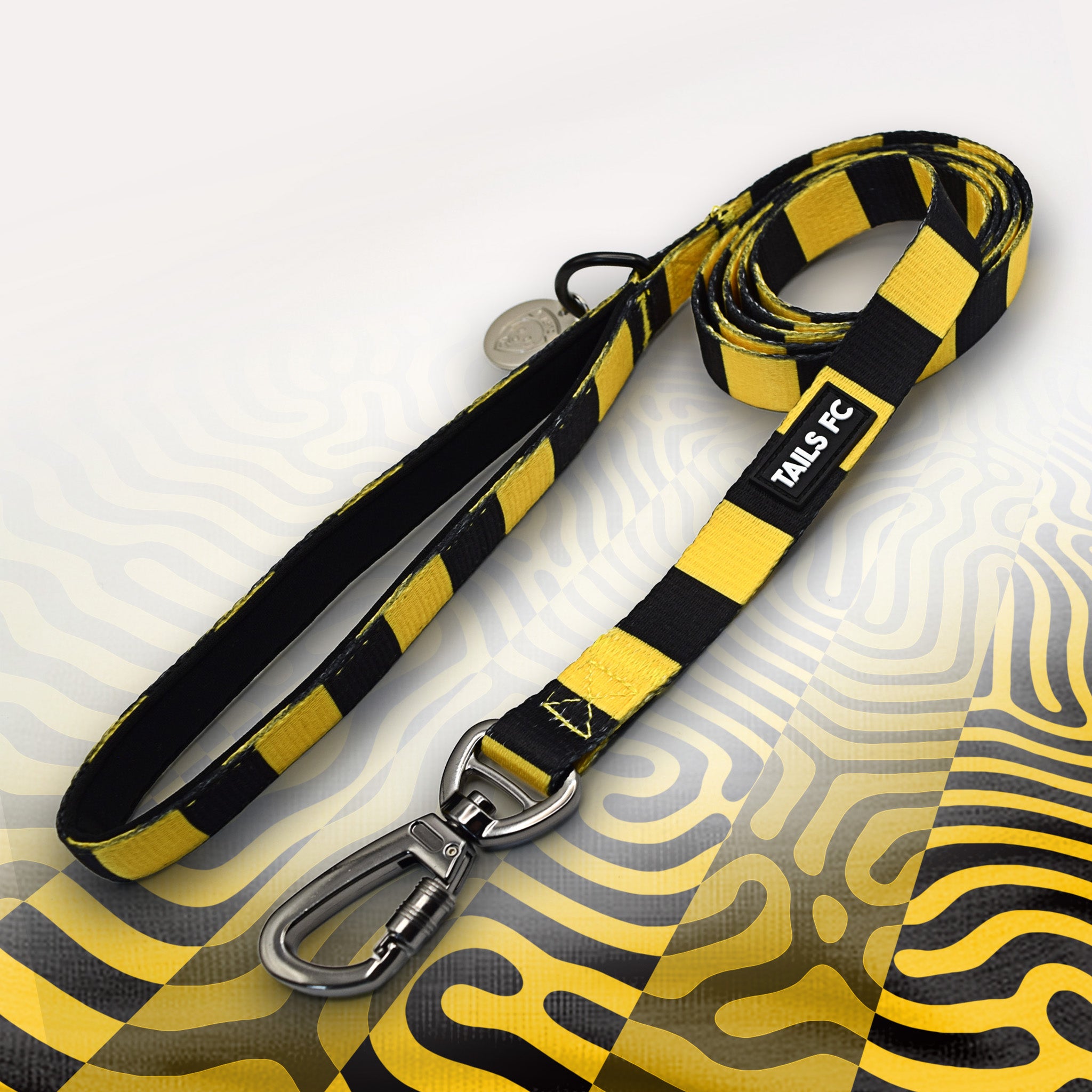 Yellow and black stripe dog lead with 'TAILS FC' logo