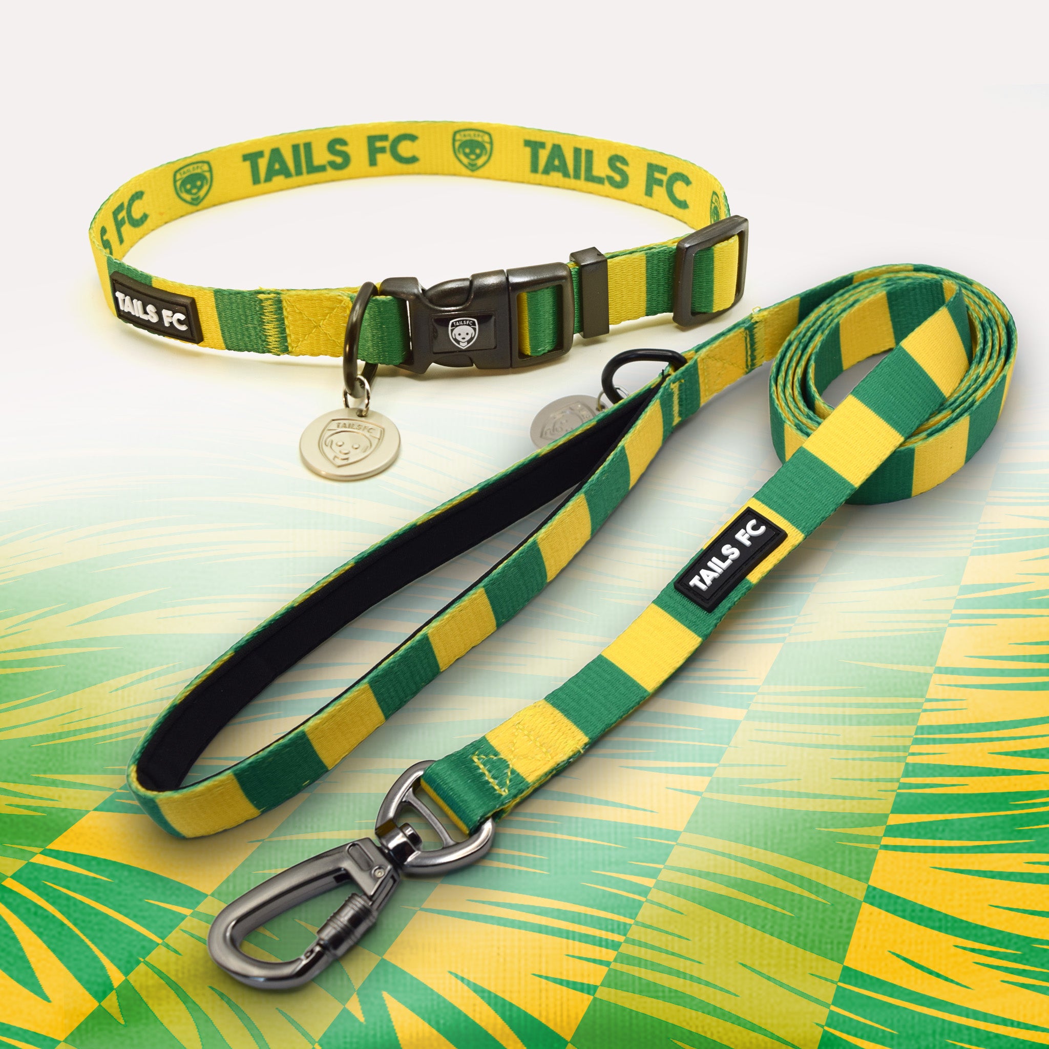Norwich yellow and green striped pet collar and leash set with 'TAILS FC' branding.