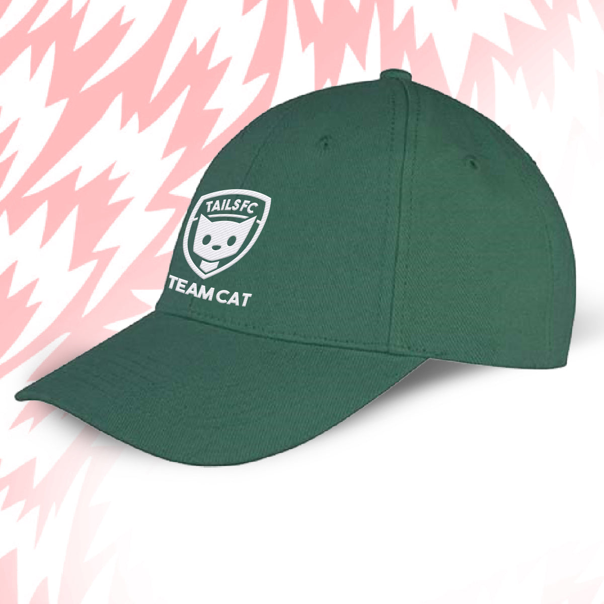 Tails FC Green cap with 'Team Cat' logo on a pink and white abstract background