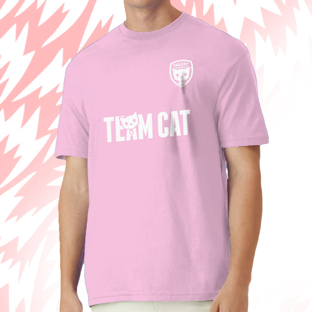 Tails FC Person wearing a pink t-shirt with 'TEAM CAT' text and logo on a pink background