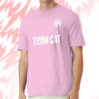 Tails FC Person wearing a pink t-shirt with 'TEAM CAT' text and logo on a pink background