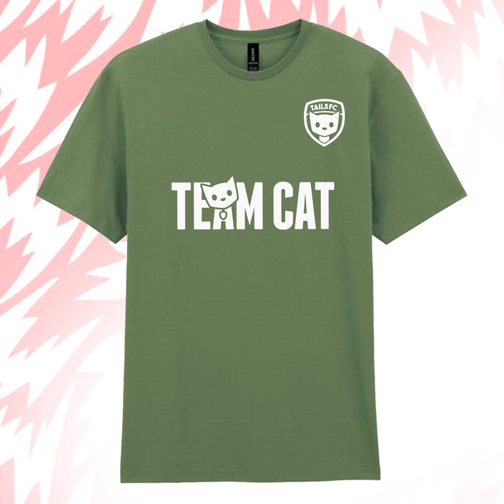 Tails FC Green t-shirt with 'Team Cat' text and logo on a pink and white abstract background