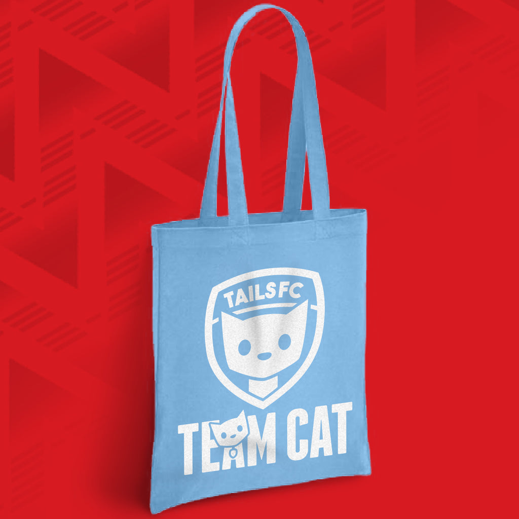 Blue tote bag with 'TAILSFC Team Cat' logo on a red background