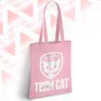 Pink tote bag with 'TAILSFC Team Cat' design on a pink geometric patterned background