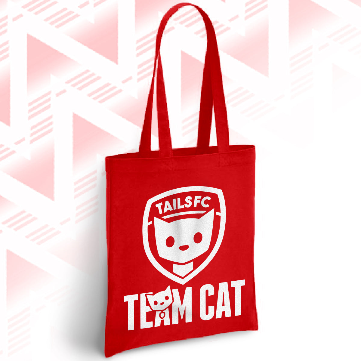 Red tote bag with 'TAILSFC Team Cat' design on a geometric patterned background