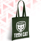 Green tote bag with 'TAILSFC Team Cat' design on a pink and white geometric patterned background