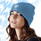 Person wearing a Tails FC blue beanie with a logo against a light blue background
