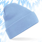 Tails FC Light blue beanie on a light blue background with abstract patterns