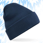 Tails FC Navy blue beanie on a light blue background with abstract patterns