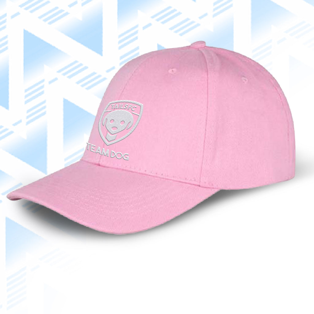 Tails FC Pink cap with TEAM DOG logo and text on a light blue geometric patterned background