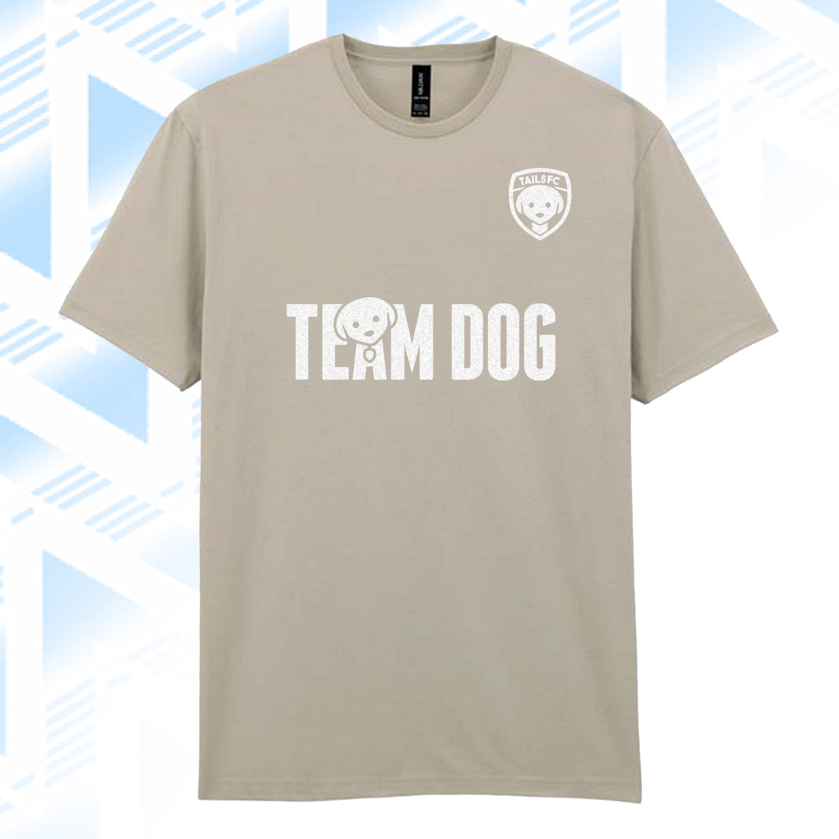 Tails FC Beige t-shirt with 'Team Dog' text and logo on a blue geometric patterned background