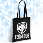 Black tote bag with 'TAILSFC Team Dog' logo on a light blue background