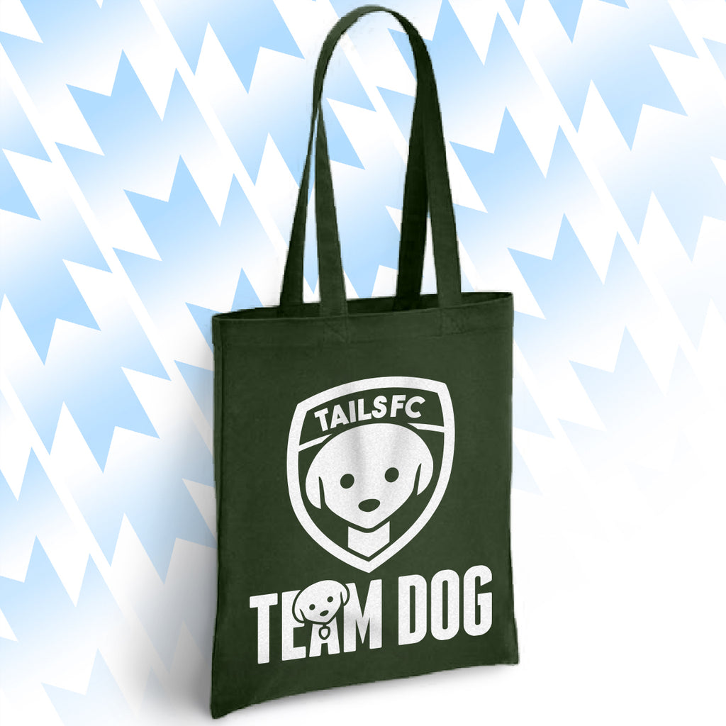 Green tote bag with 'TAILSFC Team Dog' logo on a light blue background