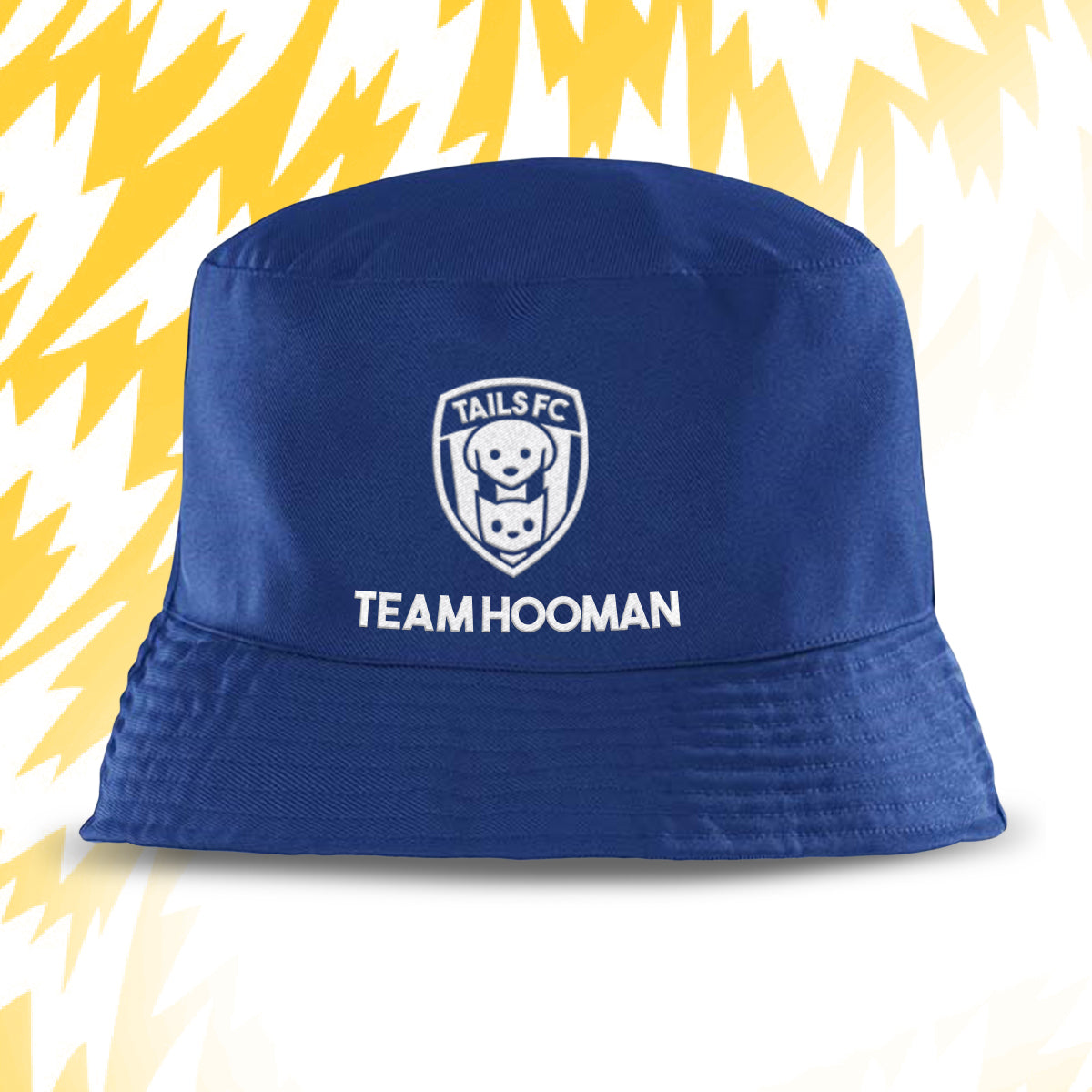 Blue bucket hat with 'Tails FC' logo and 'Team Hooman' text on a yellow and white background