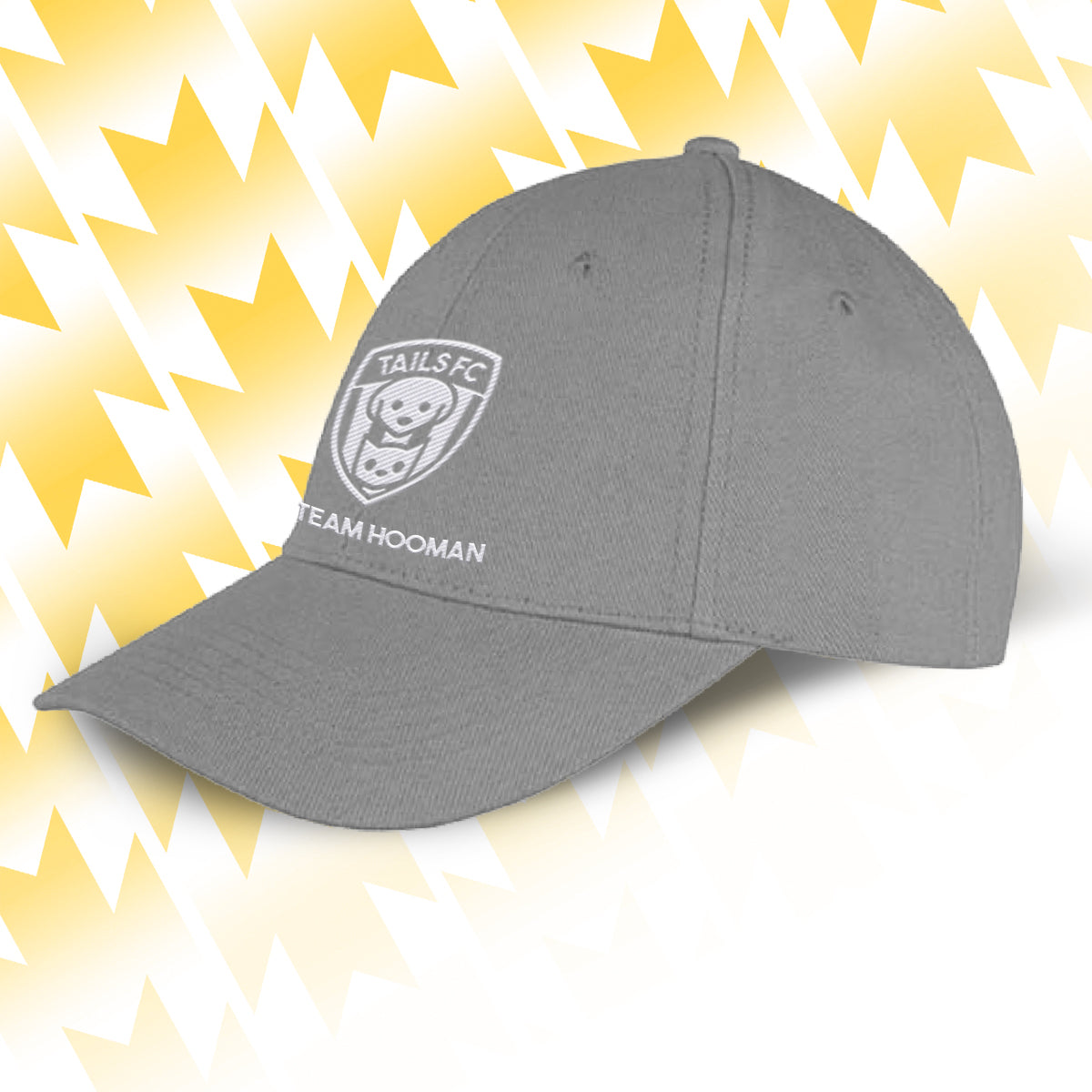 Tails FC Gray cap with logo and text on a yellow and white abstract background