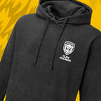 Tails FC Black hoodie with 'Team Hooman' logo on patterned yellow background