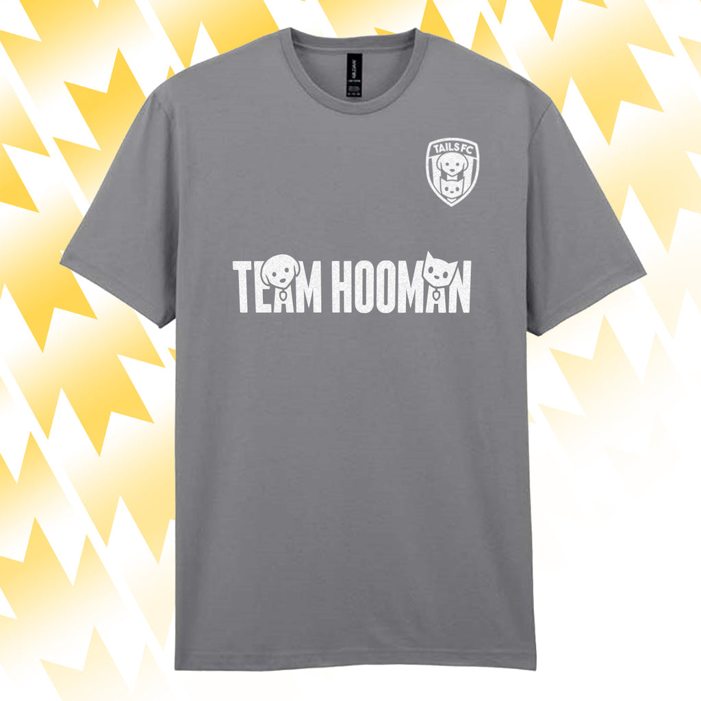 Tails FC Gray t-shirt with 'Team Hooman' text and logo on a yellow abstract background