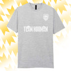 Tails FC Gray t-shirt with 'Team Hooman' text and logo on a yellow and white abstract background