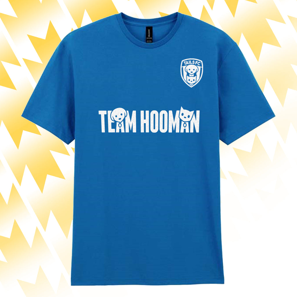 Tails FC Blue t-shirt with 'Team Hooman' text and logo on a yellow and white abstract background