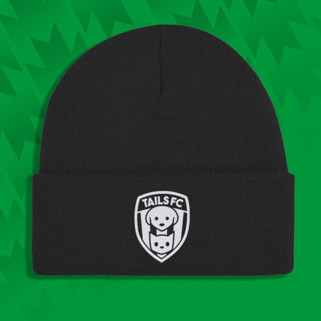 Black beanie with TAILS FC logo on a green background