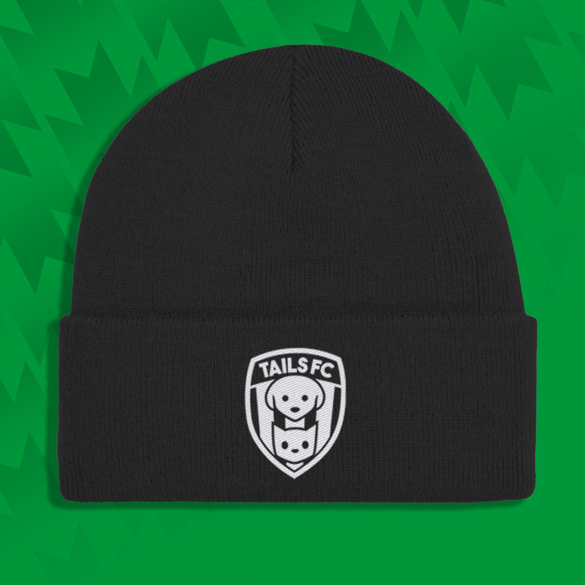 Black beanie with TAILS FC logo on a green background