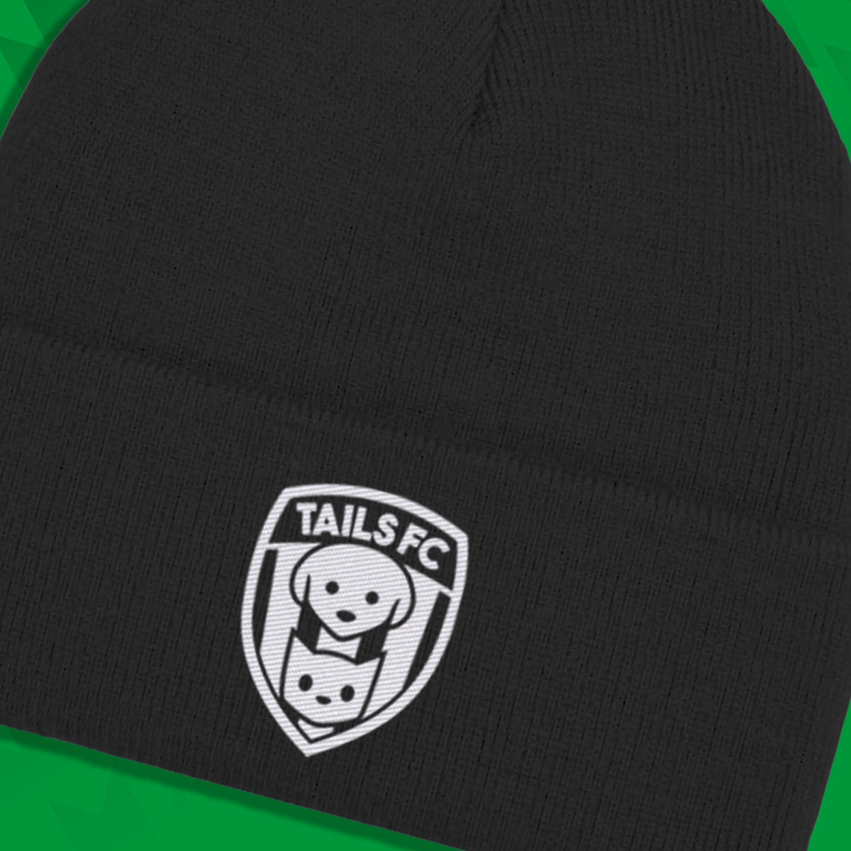 Black beanie with TAILS FC logo on a green background