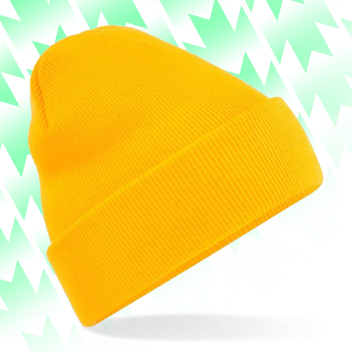 Tails FC Yellow beanie on a light green and white patterned background