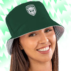 Green Tails FC bucket hat with a logo on a person against a light green background