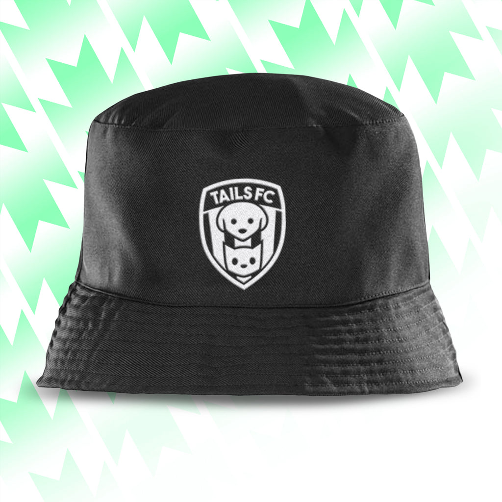 Tails FC Black bucket hat with a white logo on a light green and white striped background
