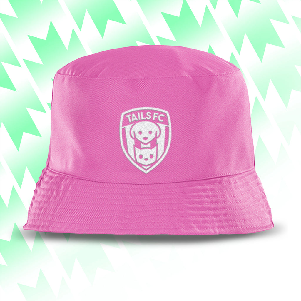 Tails FC Pink bucket hat with a logo on a green and white patterned background