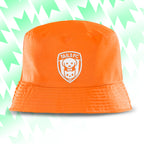 Tails FC Orange bucket hat with a logo on a light green and white chevron patterned background