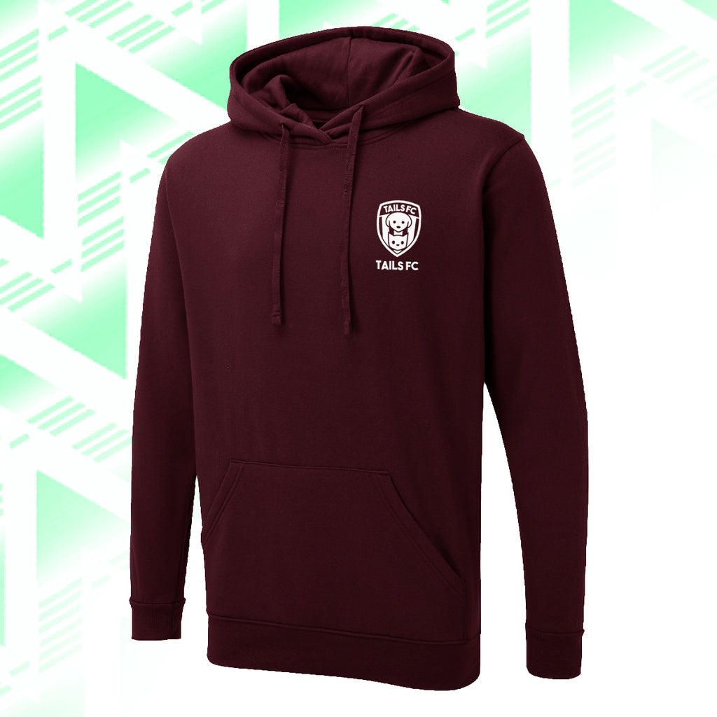 Tails FC Maroon hoodie with a logo on a green and white geometric patterned background