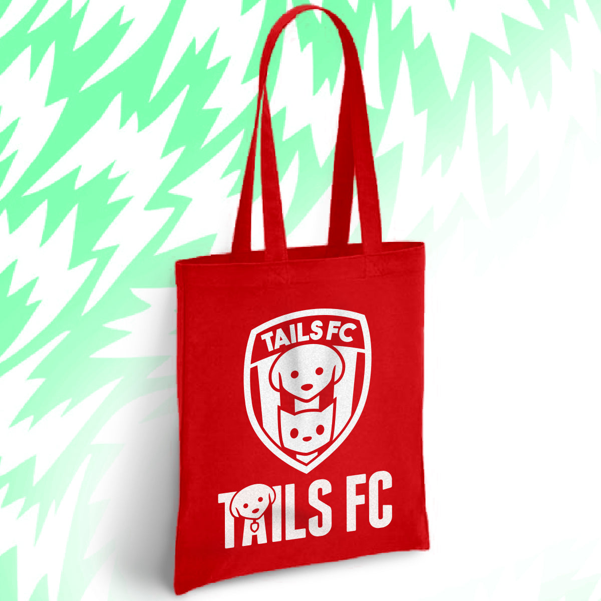 Red tote bag with 'TAILS FC' logo on a light green background
